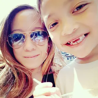 Phyillis and her son Bryan outside his martial arts class